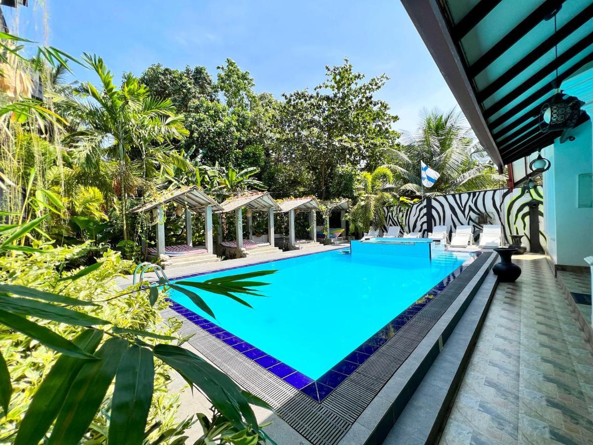 Secret Garden Hotel Hikkaduwa Buitenkant foto